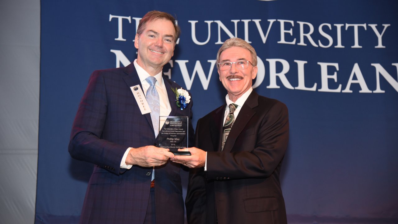 Phillip May, Entergy Louisiana president and CEO, and fellow honoree William Chauvin.